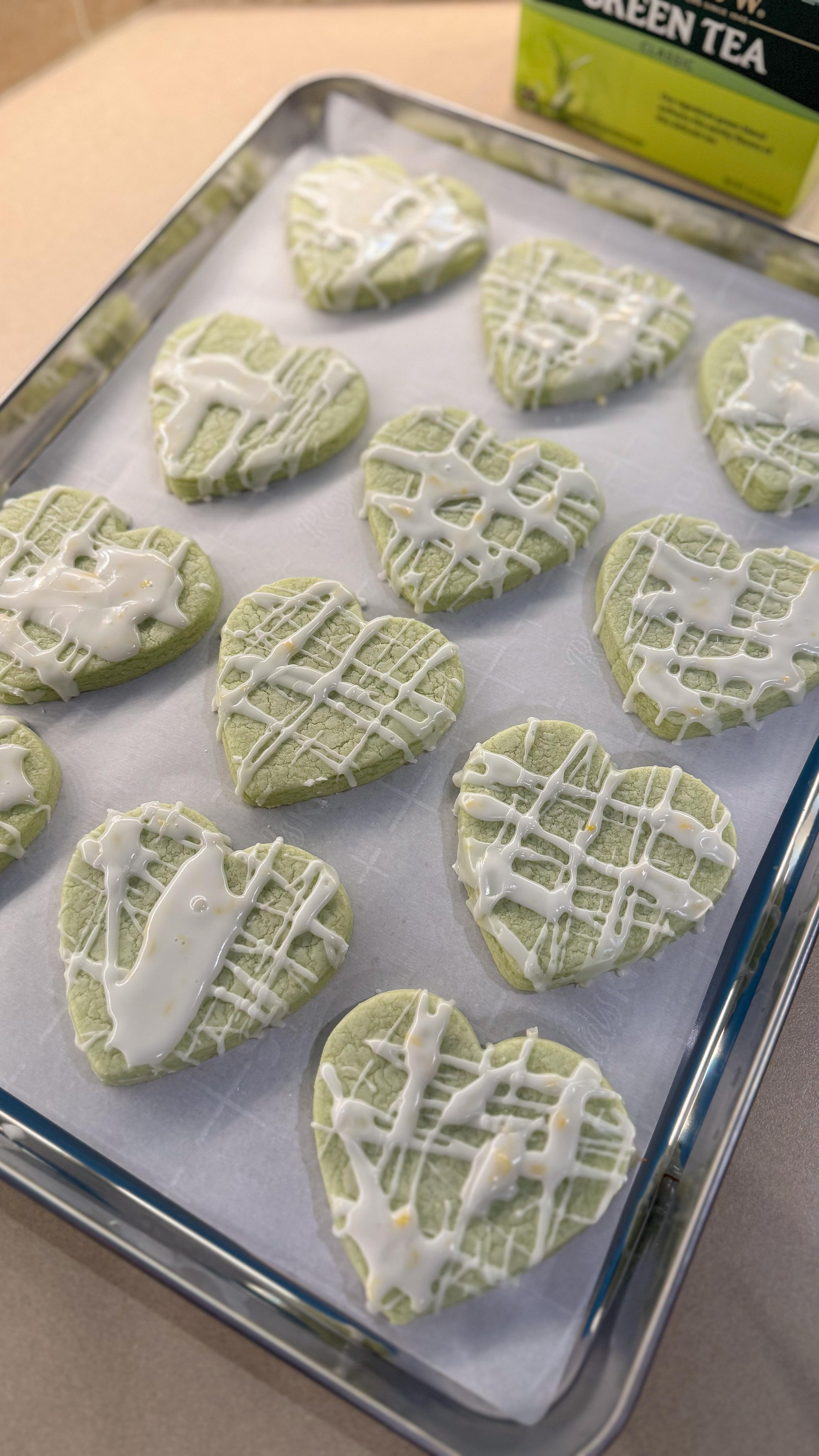 Turns out green tea isn’t just for sipping 🍵🍪🍋

I used @bigelowtea green tea to flavor these sugar cookies and let me tell you—they’re soft, buttery, and lowkey soothing?? Like edible self-care.

As someone running a one-woman bakery biz, I’m all about brands that lead with purpose. Bigelow has been women-owned and family-run for over 80 years, and they’re a certified B Corp too. That kind of energy just hits different. 💚

Ingredients
    •    2 green tea bags
    •    6 tbsp unsalted butter, melted
    •    ½ cup granulated sugar
    •    1 egg
    •    1 tsp vanilla extract
    •    1 ¾ cups all-purpose flour
    •    ½ tsp baking powder
    •    ¼ tsp salt
    •    Optional: 1-2 drops pandan extract (color)

Optional Lemon Glaze
Mix ½ cup powdered sugar + 1 tbsp lemon juice

Instructions
    1.    Infuse the butter – Melt the butter, then cut open the tea bags and stir in the tea leaves. Let it sit for 5 minutes.
    2.    Mix wet ingredients – In a bowl, whisk the tea-infused butter and sugar until combined. Add the egg and vanilla, mixing well.
    3.    Combine dry ingredients – In another bowl, whisk the flour, baking powder, and salt. Slowly add this to the wet mixture until a dough forms.
    4.    Chill the dough – Wrap the dough in plastic wrap and refrigerate for 30 minutes.
    5.    Roll & cut – Roll the dough to ¼ inch thickness. Use cookie cutters to cut out shapes.
    6.    Bake – Preheat oven to 350°F. Bake for 8-10 minutes, or until the edges are just lightly golden.
    7.    Cool & decorate – Let the cookies cool on the sheet for a few minutes before transferring to a rack. Once cooled add lemon glaze!

#GreenTea #Cookies #BigelowTea #WomenInBusiness #SupportSmall #Baking #GreenTeaCookies #lemon #lemonglaze #sugarcookies #heartcookies