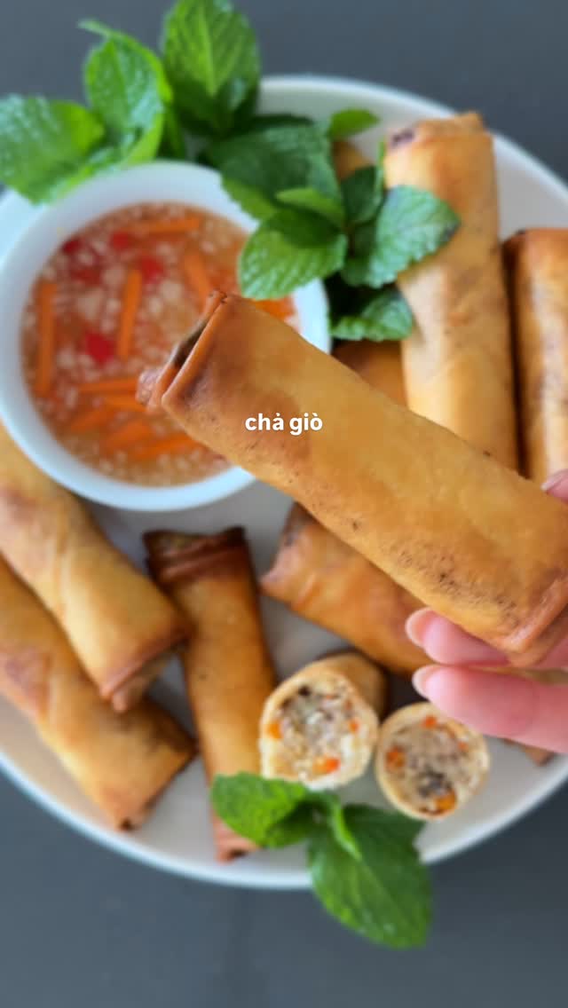 cha giò fresh out the fryer >>> 😮‍💨
also the double fry method? game changer.

recipe 🔎 google “jenhdao cha giò”

🧾 Cha Giò (Vietnamese Egg Rolls)

Filling
1.5 lb ground pork
3/4 cup bean thread noodles
1/2 cup wood ear mushrooms
3/4 cup carrot or jicama
3/4 cup shallot/onion
3–4 cloves garlic

Seasoning
1 egg
1–1.5 tbsp fish sauce
1 1/2 tsp sugar
3/4 tsp black pepper
1/2 tsp chicken bouillon
1/4 tsp MSG

Sealer
1 tbsp flour + 1/4 cup water

🥟 Directions
• Soak noodles + mushrooms 30 min, chop finely
• Mix filling + seasonings until slightly sticky
• Microwave a small spoonful to taste test
• Rest filling 20–30 min
• Roll tightly and seal
🔥 Double Fry Method
• Fry at 325°F for 6–7 min
• Rest 10–15 min
• Fry again at 375°F for 2–3 min until crispy + golden

#chagio #vietfood #vietnamesefood #asianrecipes #eggrolls