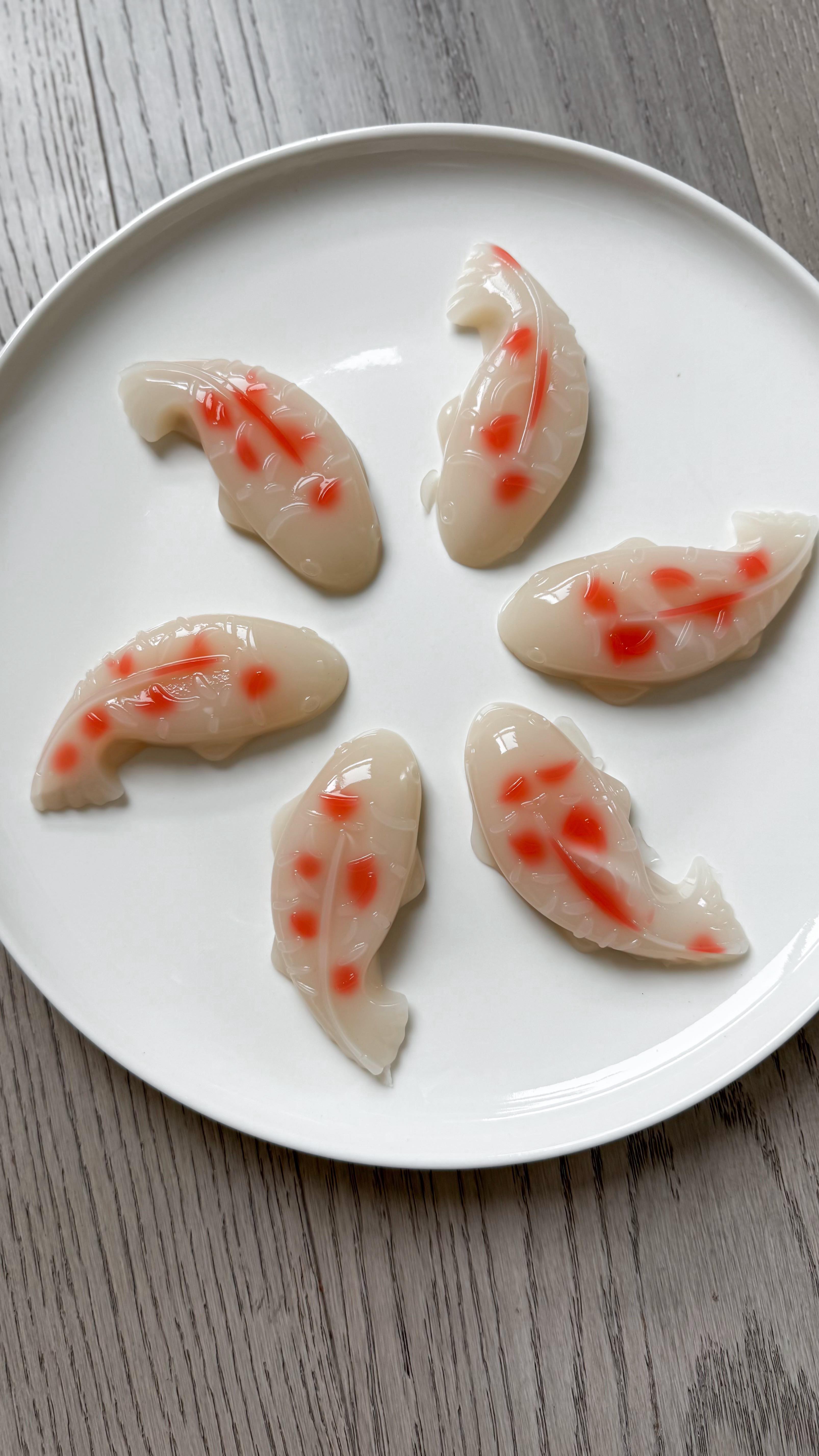 a Viet dessert made for hot days: sương sá dừa ☀️🥥 using fresh coconut juice + pulp! 🐟 

recipe 🔎 google “jenhdao coconut jelly”

🔪 is from @thenikosknife

Ingredients

For the jelly base:
* 1½ cups coconut water (fresh or bottled)
* ½ cup full-fat coconut milk (Chaokoh or Aroy-D)
* 2½ tsp agar agar powder
* ¼ cup sugar (adjust to taste)
* Optional: Coconut meat strips

For red koi spots (optional):
* ¼ cup jelly mixture
* 1–2 drops red food coloring

#SuongSaDua #VietnameseDessert #CoconutJelly #AgarAgar #VietFoodie #AsianDessert #PlantBasedDesserts #KoiFish #OCeats #CoconutDessert #nikosknife